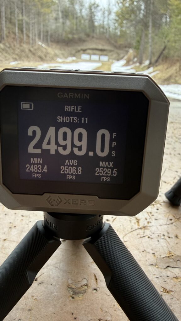 How to use a chronograph: a focused shooter at a session where a chronograph measures velocity