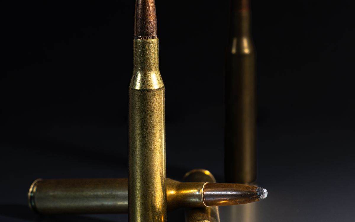 Rifle cartridges lined up — finding a velocity node with a ladder test
