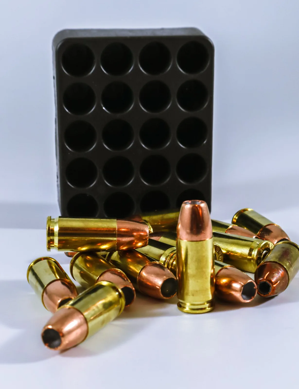 how to start reloading — cartridges and a loading block on a bench