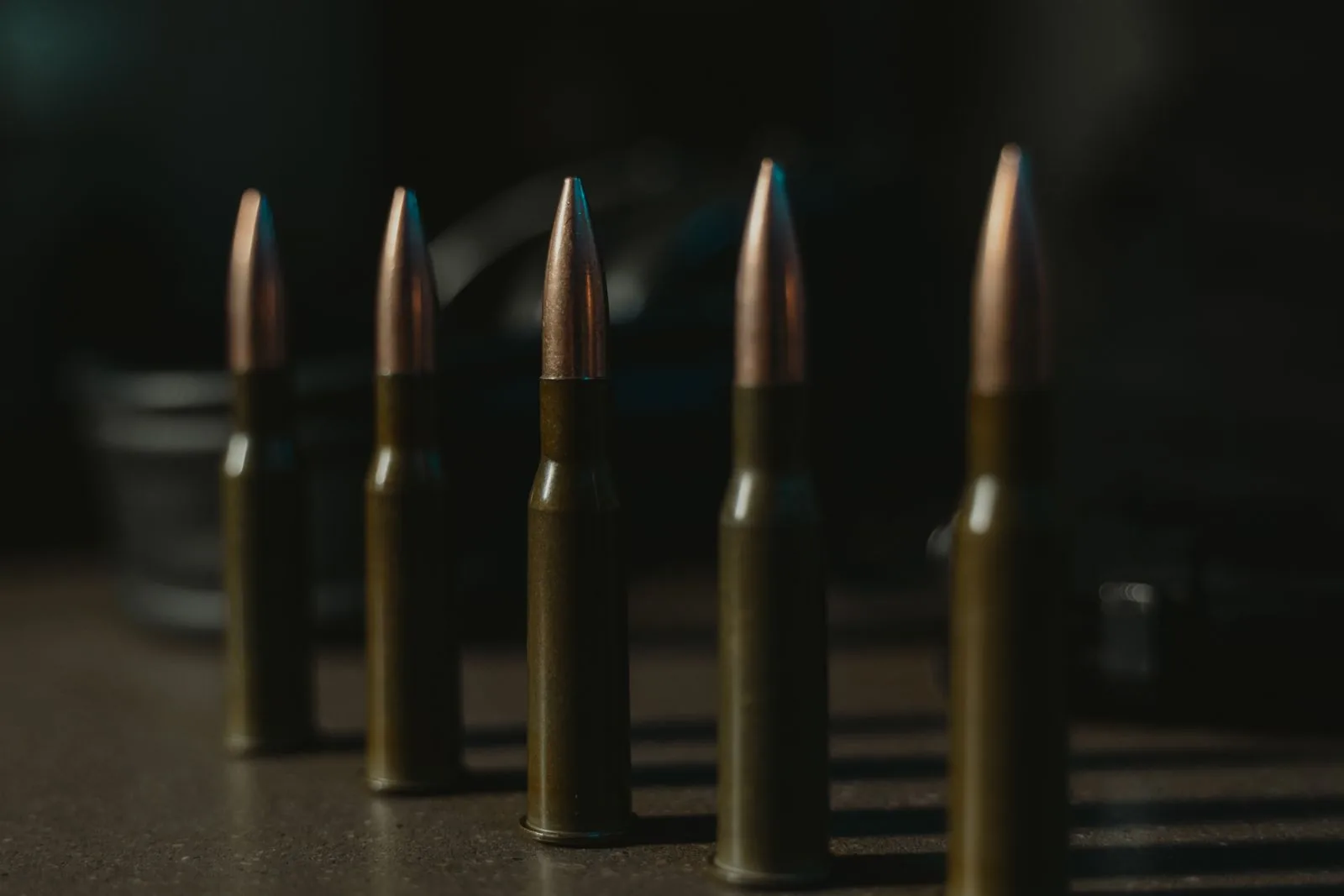 sync reloading data — rifle cartridges lined up in a row